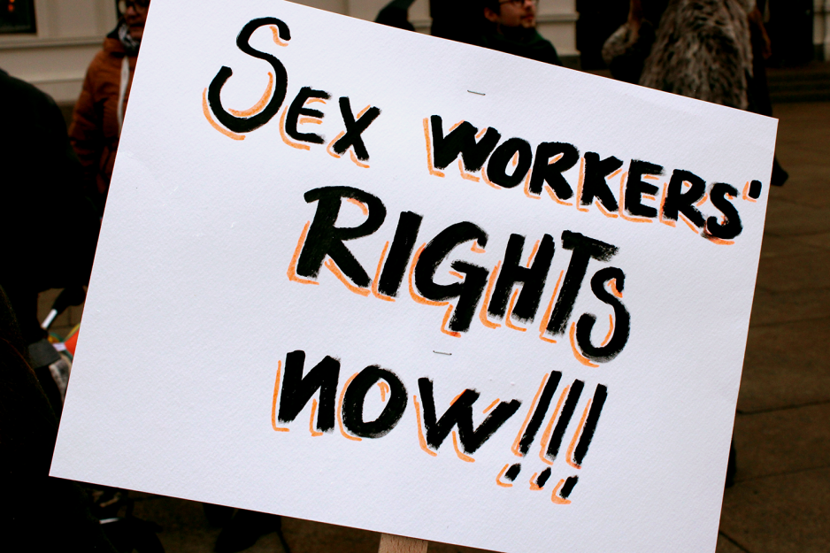 Plakat der det står sex workers rights now