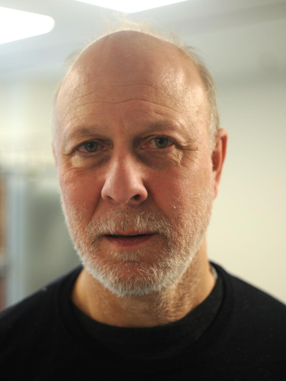 Portrett av f&oslash;rsteamanuensis ved institutt for arkiv-, bibliotek- og informasjonsfag Knut Oterholm