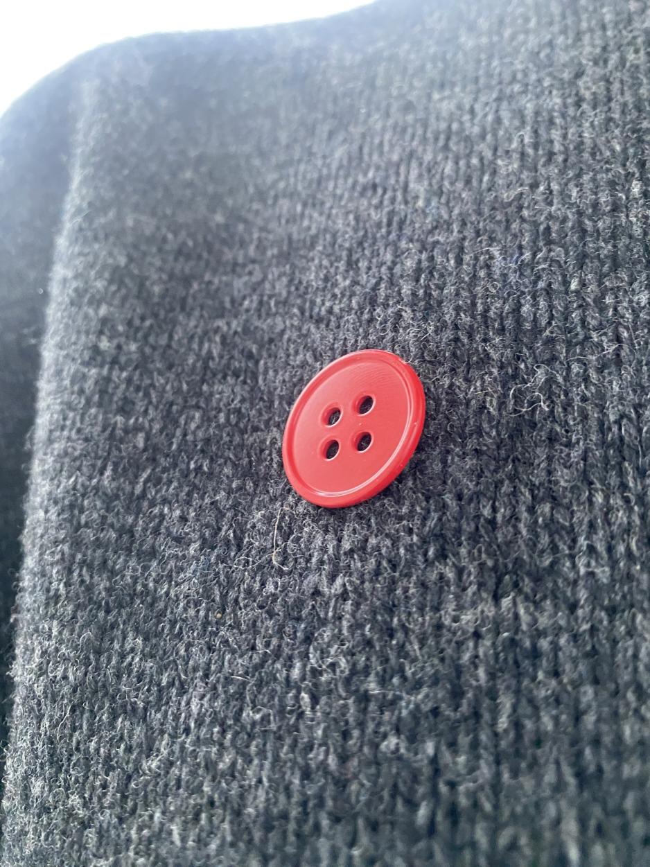 Bilde av en r&oslash;d knapp fra alliansen R&oslash;d Knapp