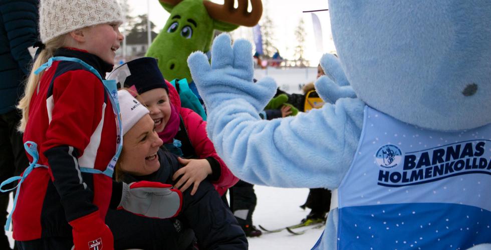 Familie som er glade for &aring; m&oslash;te p&aring;